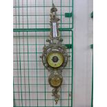 A German gilt metal aneroid barometer