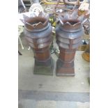 A pair of salt glazed crown chimney pots