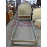 A 19th Century French rococo style upholstered single bed