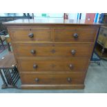 A Victorian Aesthetic Movement painted pitch pine chest of drawers