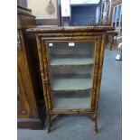 A Victorian bamboo side cabinet