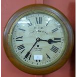 A beech circular fusee wall clock, the dial signed M.R.C. Gillett, Bland & Co.