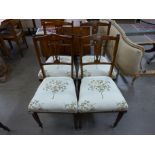 A set of four Edward VII inlaid rosewood salon chairs