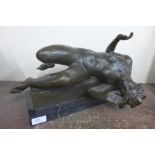 A French style bronze figure of a reclining female nude,