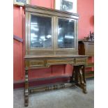 A 19th Century rosewood and brass inlaid writing table/bookcase