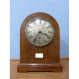 An early 20th Century Empire oak mantel clock
