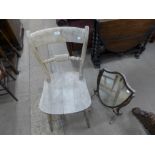 A Victorian beech kitchen chair and mahogany shield shape toilet mirror