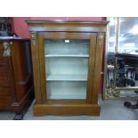 A Victorian inlaid walnut pier cabinet