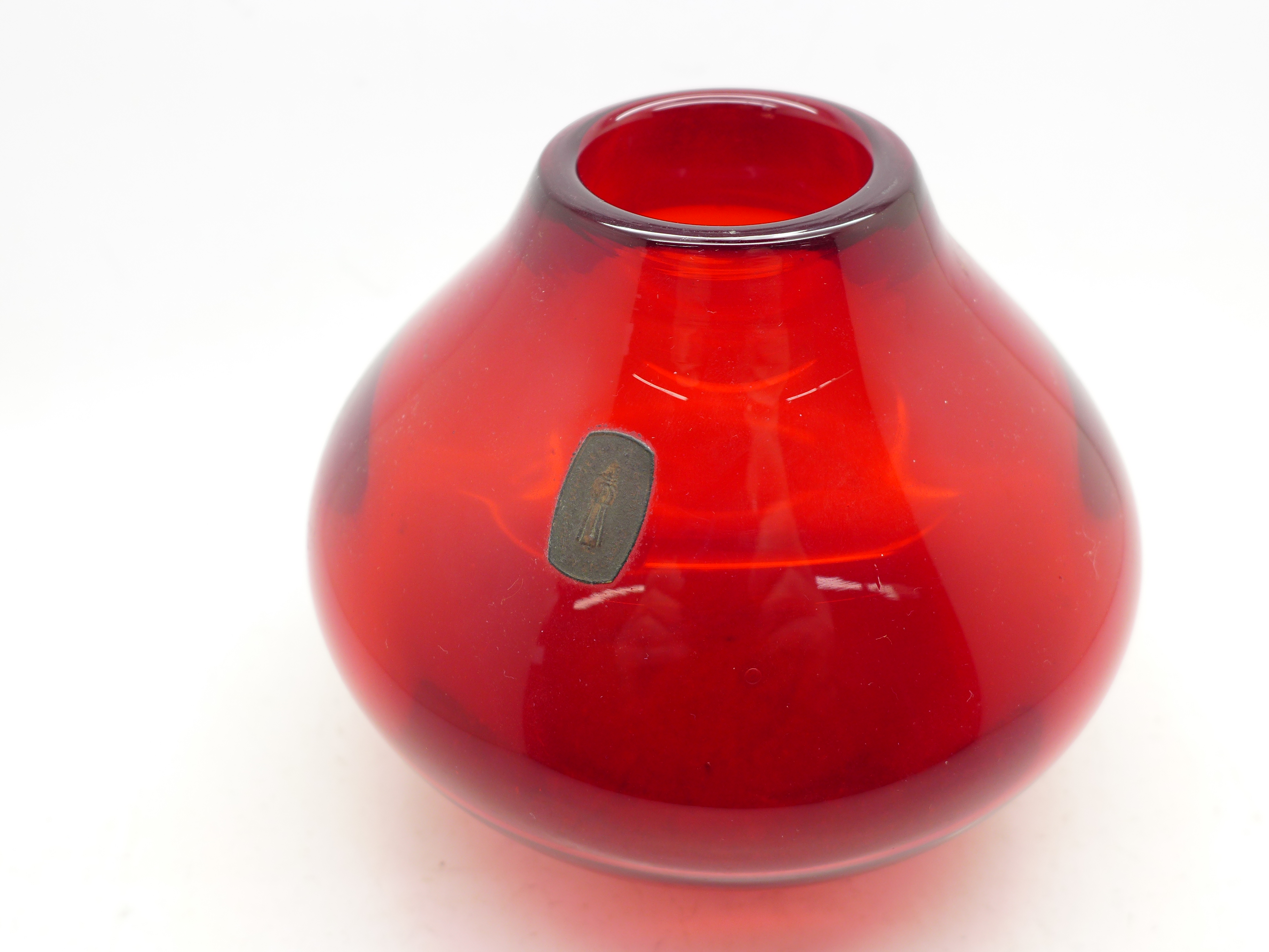 A Whitefriars vase by Geoffrey Baxter in ruby, 12.