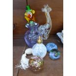 Assorted glassware including a Murano clown, a Caithness paperweight and vase, etc.