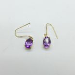 A pair of 9ct gold and amethyst earrings