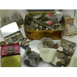 A collection of coins and banknotes,