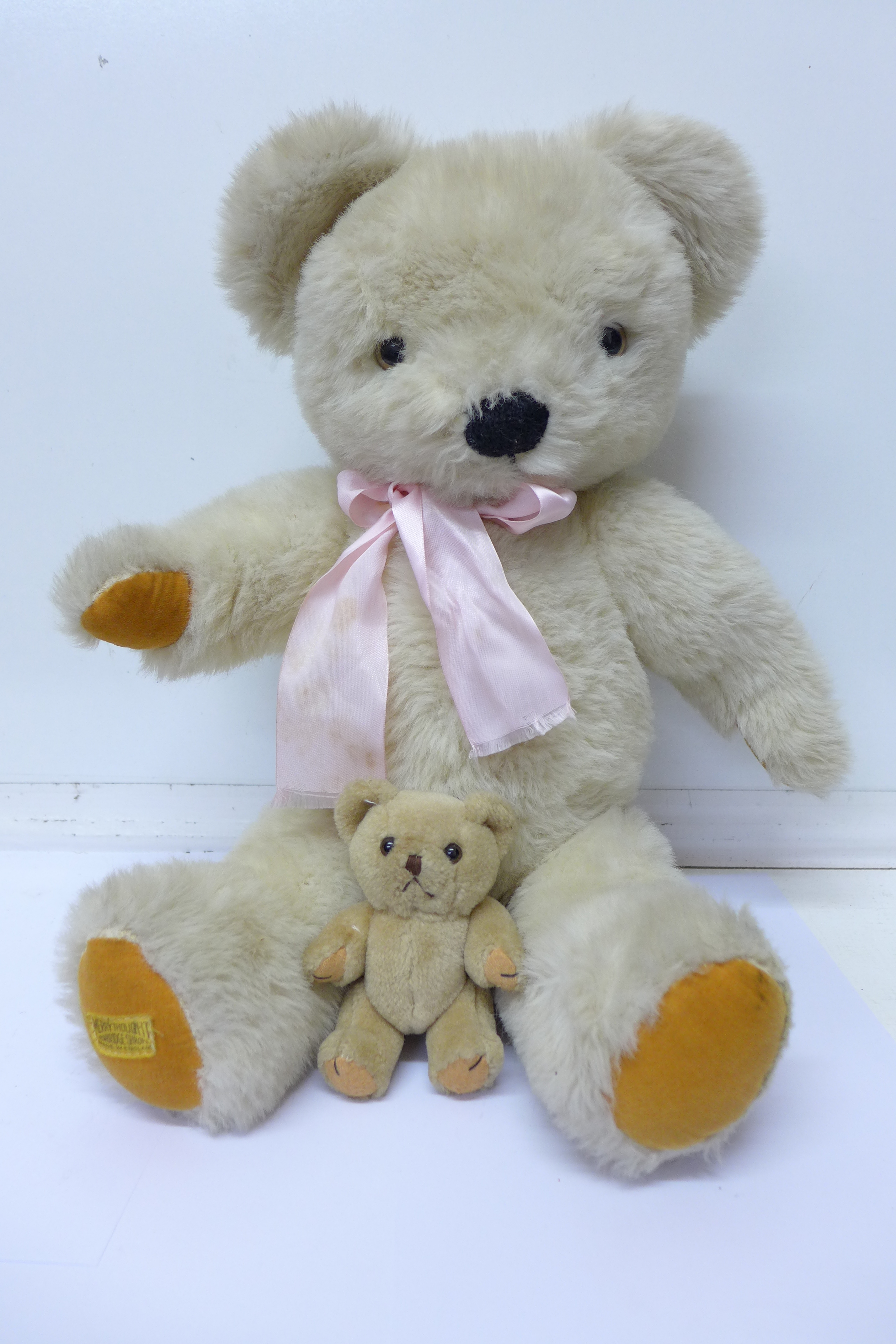 A Merrythought Teddy bear and one other smaller Teddy bear