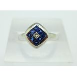 An 18ct white gold, sapphire and diamond ring, 4g,