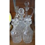 Five cut glass decanters, including Webb Corbett,