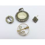 A paste set photograph pendant, a brooch, etc.