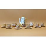 A Royal Worcester Walter Sedgley coffee set, six setting, with coffee pot, cream and sugar,