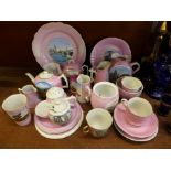 A collection of pink transferware souvenir china, some marked Made In Germany,