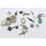 Silver jewellery including a coin bracelet and a silver fob