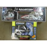 A Salvation Max remote control helicopter, boxed and a Vectron Ultralite wireless flying saucer,