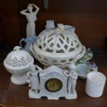 Two pierced creamware lidded bowls, marked Leeds ware and Wedgwood, a figural clock, two vases,