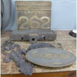 Five metal name plaques including Brooks & Doxey and Royce,