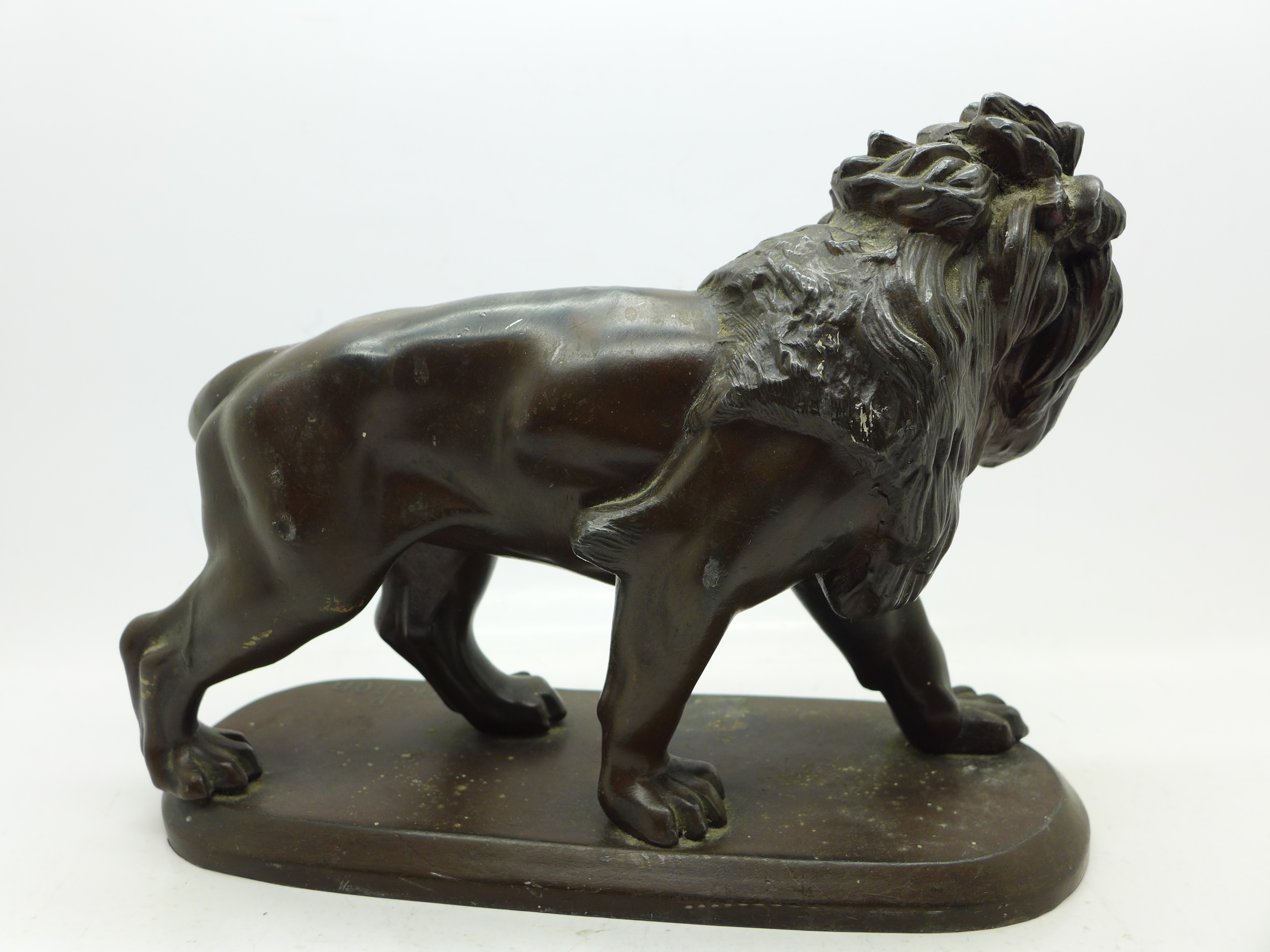 A cast metal figure of a lion signed Coinchon, - Image 4 of 4