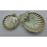 Two silver shell dishes,