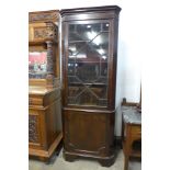 An Edward VII mahogany freestanding corner cabinet