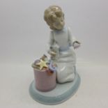 A Lladro figure, The Night Before Christmas Collection, with associated box,