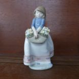 A Lladro figure, May Flowers, boxed,