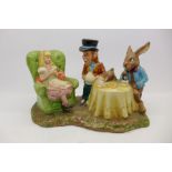 A Beswick figure group, limited edition 779 of 1998, The Mad Hatter's Tea Party,