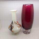 A red glass vase with bubble base and one other glass vase,