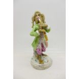 A Meissen style figure of a dressed monkey playing a clarinet, 12.