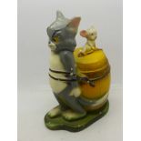 A Tom and Jerry money box,