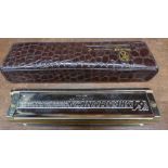 A Hohner The 64 Chromonica Professional harmonica,