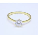 A silver gilt simulated diamond solitaire ring,