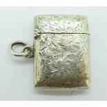 A silver vesta case,