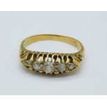An 18ct gold and five stone diamond ring, 3.