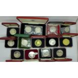 A collection of fourteen silver proof coins, including Iceland 874-1974 two coin set,