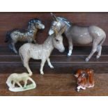 Two Beswick donkeys and a Shetland pony, and two other small model horses,