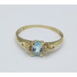 A 9ct gold, aquamarine and diamond ring, 1g,