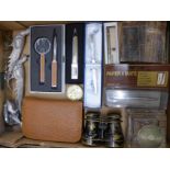 Desk accessories, a gentleman's travel vanity set, a pair of field glasses, etc.