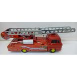 A 1960's battery powered Japanese tin plate fire engine