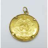 A gold mounted 1892 1 Pond coin, weight of coin 8g, mount 9ct gold 0.