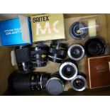 Eleven camera lenses including Sirius and Praktica