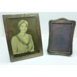 Two silver photograph frames,