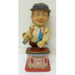 A 1960's battery operated toy of Charlie Weaver Bartender