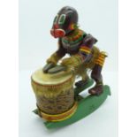 A Japanese clockwork African drummer toy by TPS