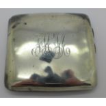 A silver cigarette case,